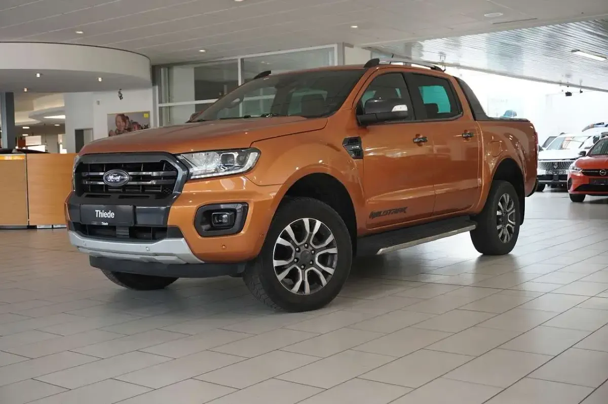 Gebraucht Ford Ranger Wildtrack 212 PS (155 kW) 2023 Orange metallic Pickup