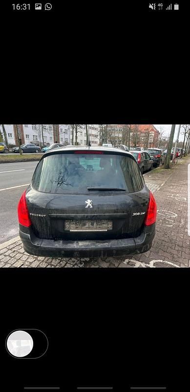 Gebraucht Peugeot 308 120 PS (88 kW) 2013 Schwarz Kombi