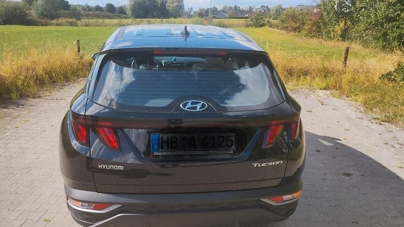 Schwarz Gebraucht 2023 Hyundai Tucson Trend SUV | 21.700 € (Superpreis) - Bild 1/4