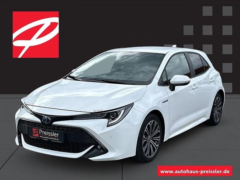 Super white 2 Gebraucht 2021 Toyota Corolla Hybrid Team Limousine | 19.968 € (Guter Preis) - Bild 1/2