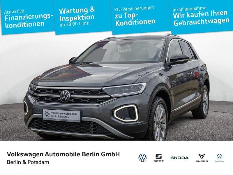 Indiumgrau metallic/schwarz Gebraucht 2024 VW T-Roc Style SUV | 30.990 € (Fairer Preis) - Bild 1/4