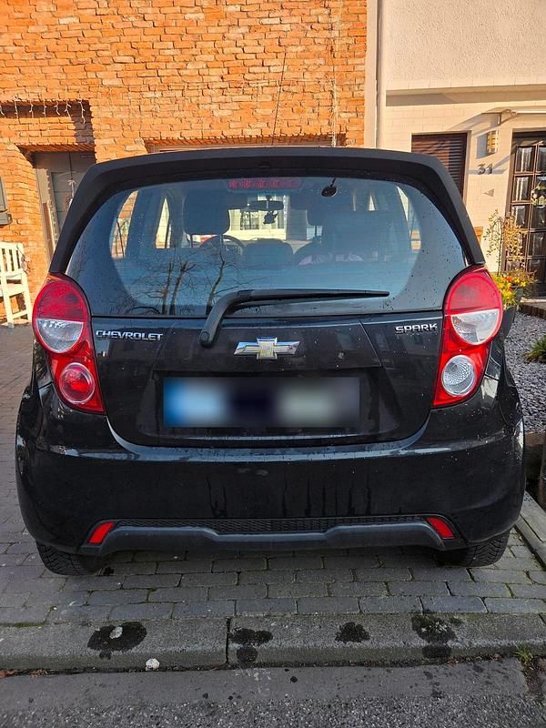Gebraucht Chevrolet Spark 68 PS (50 kW) 2012 Schwarz Kleinwagen