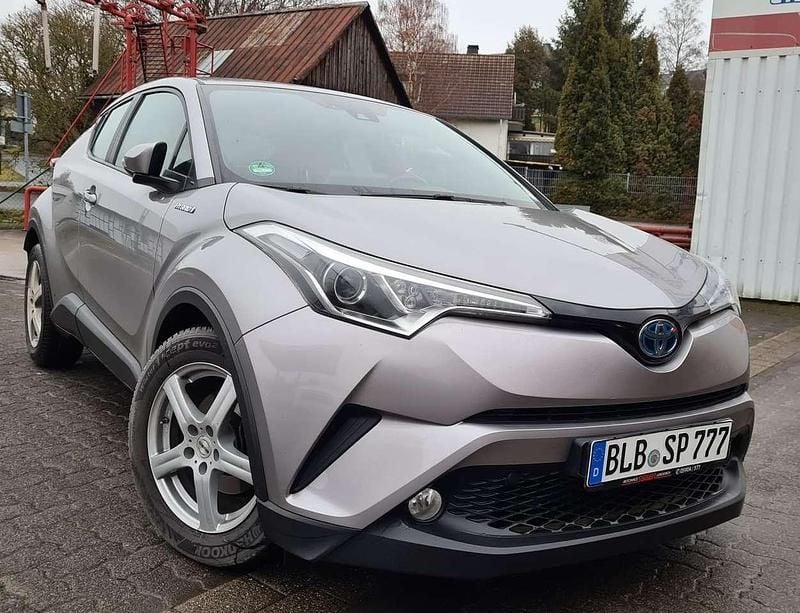 Grau Gebraucht 2016 Toyota C-HR SUV | 13.100 € (Superpreis) - Bild 1/4