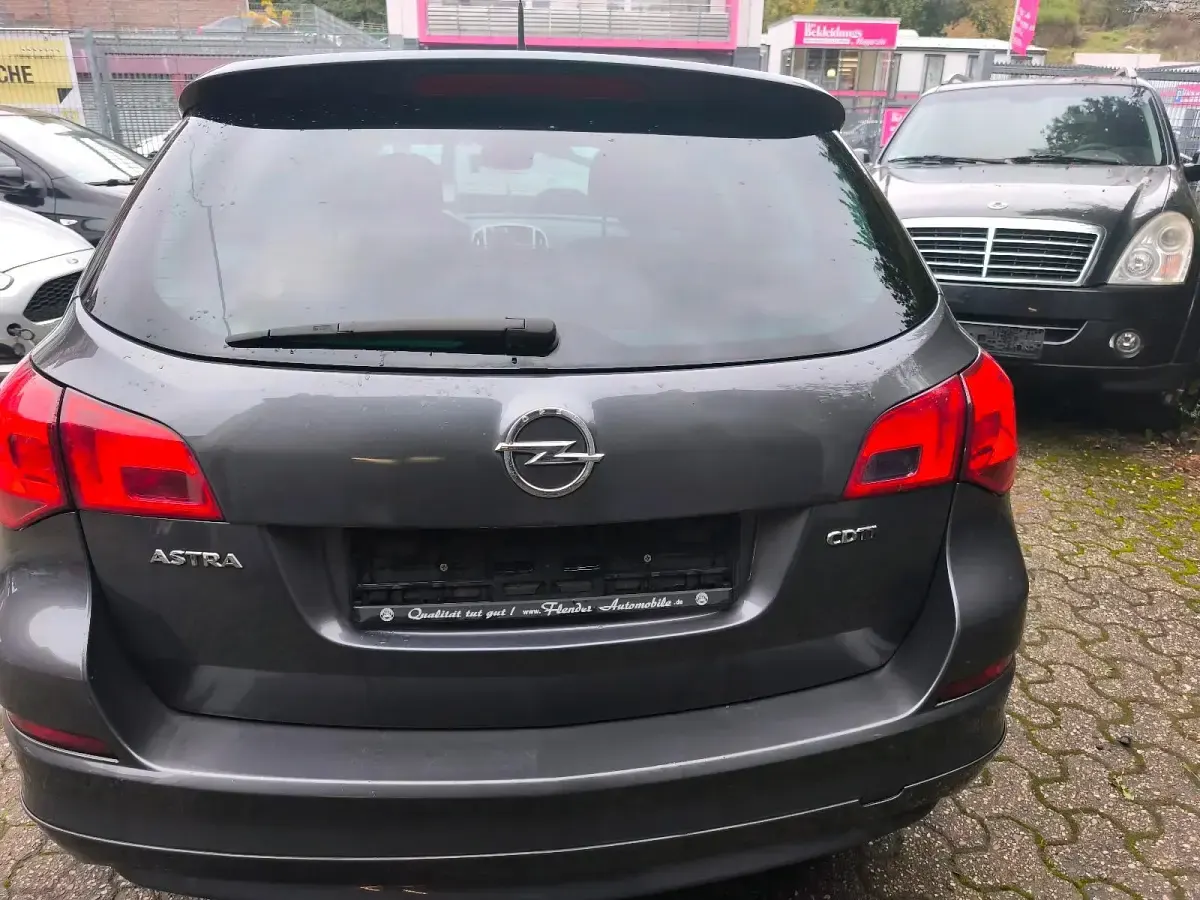 Gebraucht Opel Astra 125 PS (91 kW) 2011 Grau Kombi
