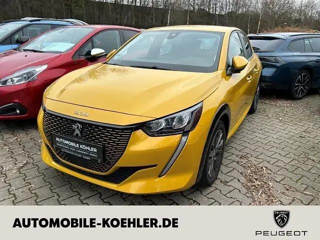 Lack gelb faro/typ aussenverkl Gebraucht 2021 Peugeot e-208 Active Kleinwagen | 14.890 € (Fairer Preis) - Bild 1/4
