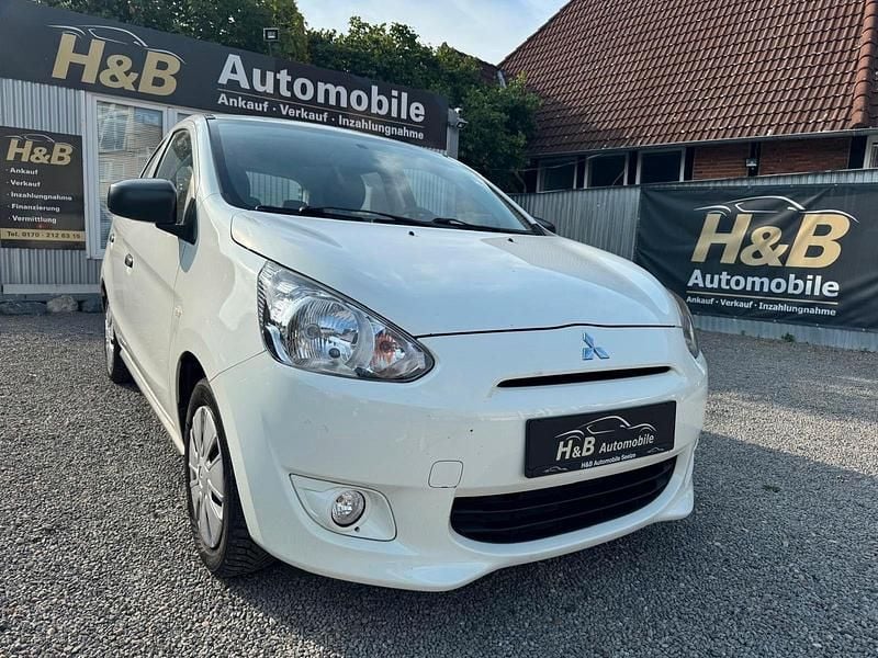 Weiß Gebraucht 2015 Mitsubishi Space Star Diamant Edition Kleinwagen | 4.490 € (Guter Preis) - Bild 1/4