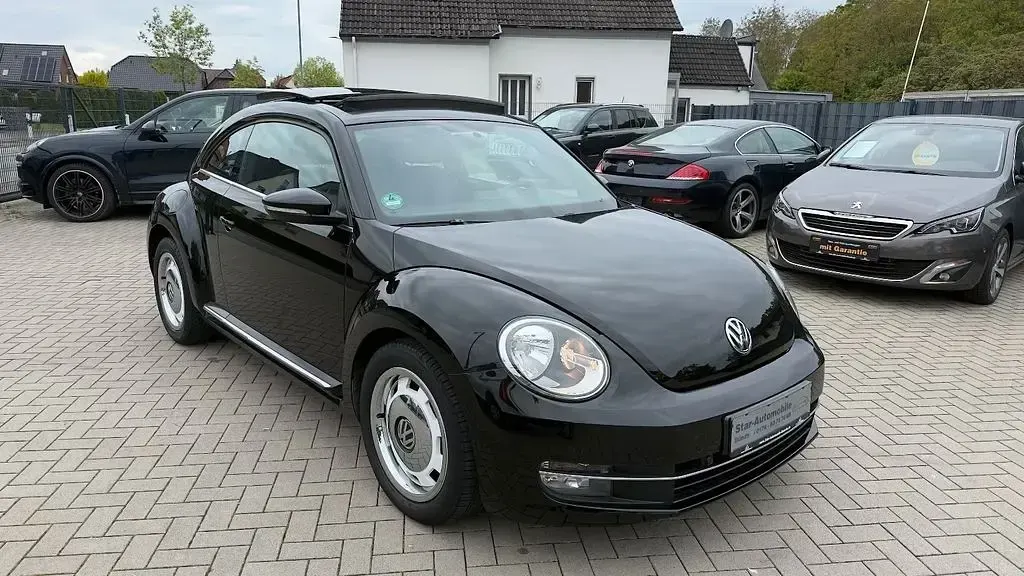 Gebraucht VW Beetle Design 105 PS (77 kW) 2012 Ebenholzschwarz Kleinwagen
