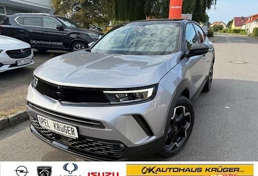 Gebraucht Opel Mokka Ultimate 131 PS (96 kW) 2023 Kontrast grau/quarz silber (metallic) SUV