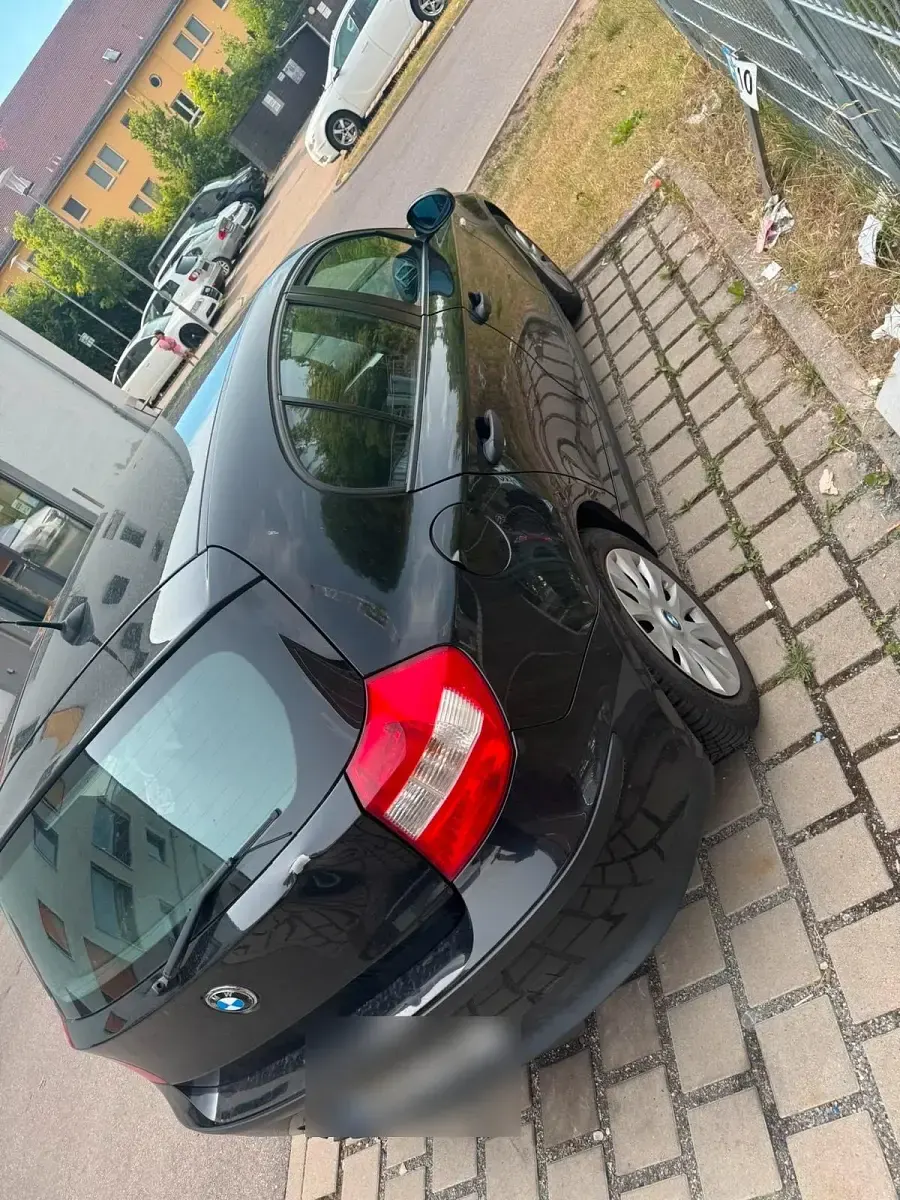 Gebraucht BMW 116 122 PS (89 kW) 2006 Schwarz Kleinwagen