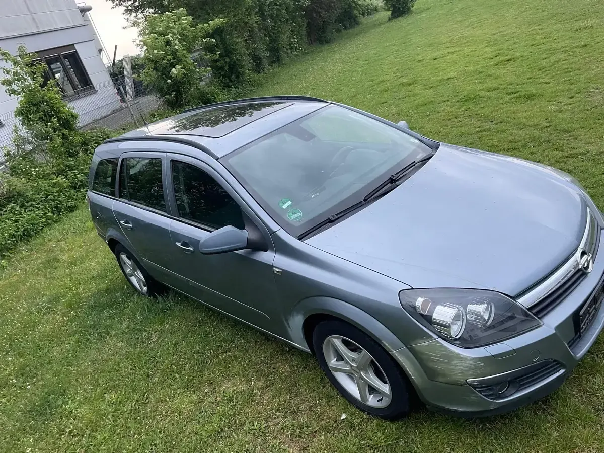Używany Opel Astra 105 KM (77 kW) 2007 Szary Kombi