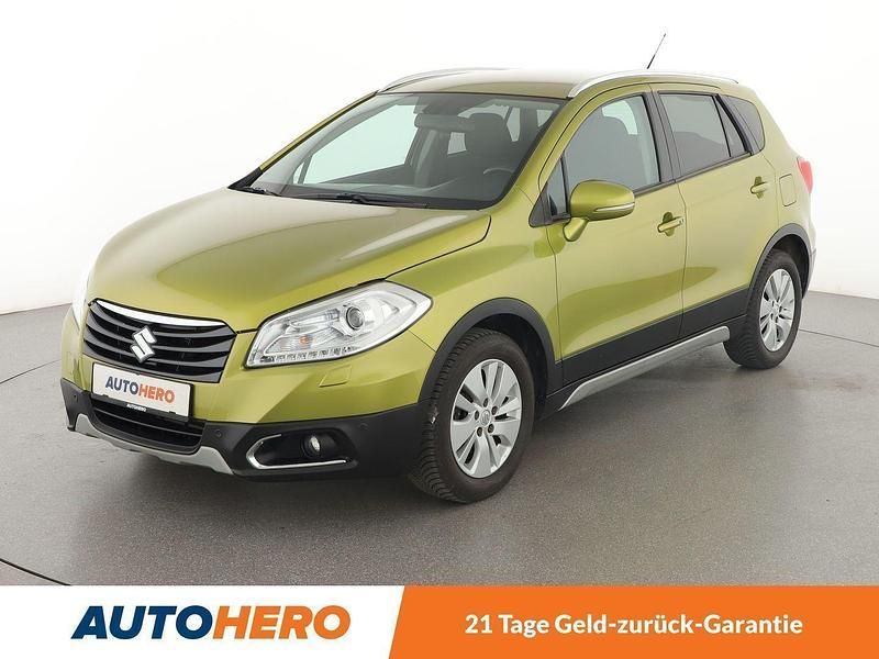 Grün Gebraucht 2014 Suzuki SX4 Comfort+ SUV | 12.090 € (Fairer Preis) - Bild 1/3