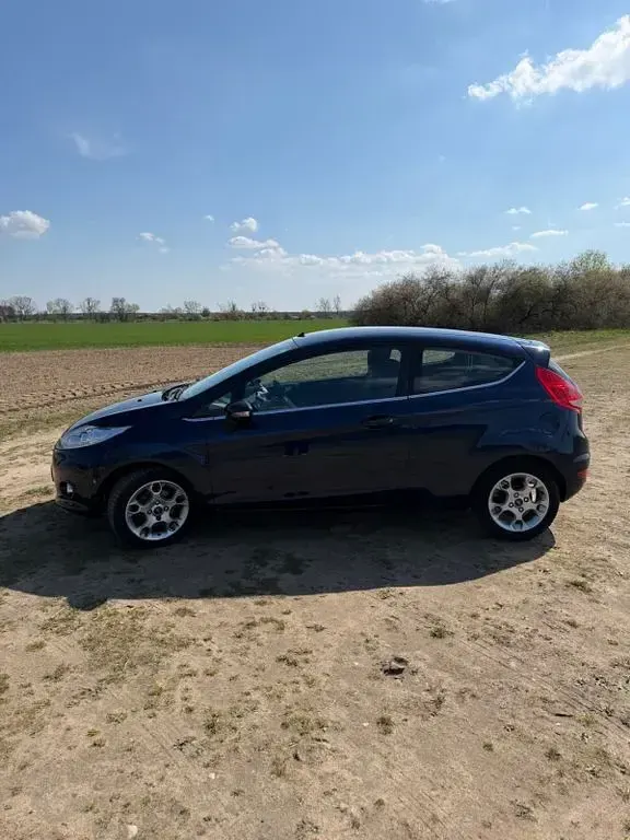 Gebraucht Ford Fiesta Trend 82 PS (60 kW) 2012 Blau Limousine