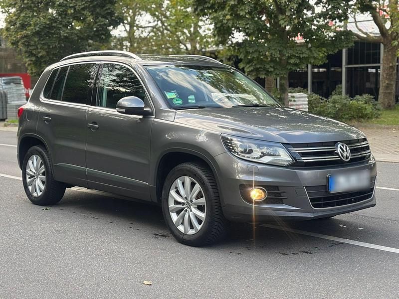 Grau Gebraucht 2013 VW Tiguan SUV | 7.999 € (Fairer Preis) - Bild 1/4