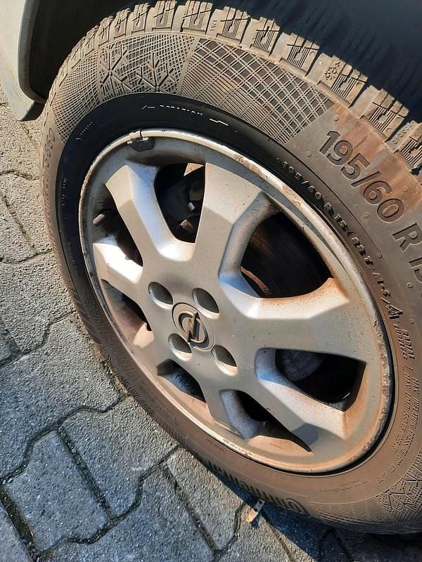 Second-hand Opel Astra 84 CP (61 kW) 2009 Argintiu Coupe