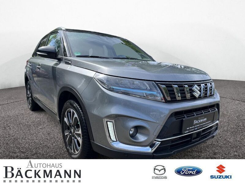 Grau Gebraucht 2023 Suzuki Vitara Comfort+ SUV | 20.990 € (Fairer Preis) - Bild 1/3