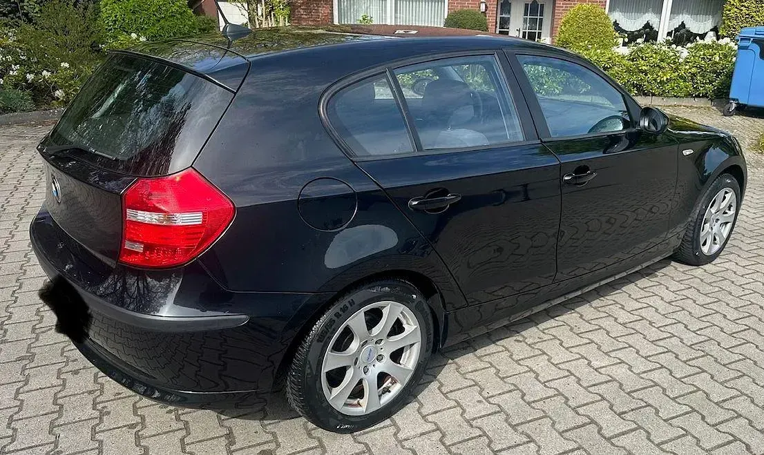 Second-hand BMW 116 122 CP (89 kW) 2009 Negru Hatchback