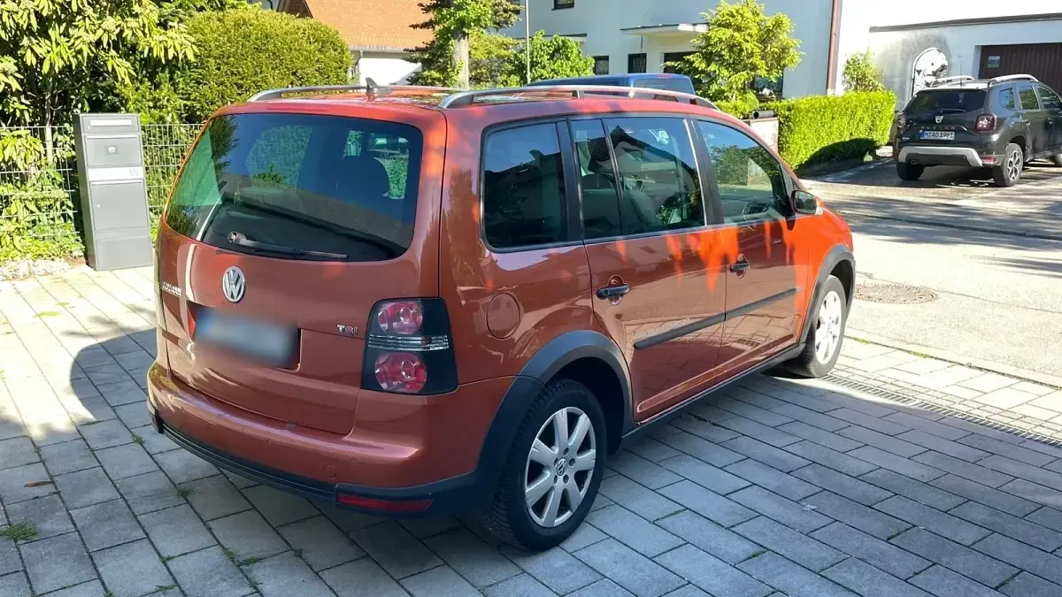 Używany VW Touran Cross 170 KM (125 kW) 2007 Pomarańczowy Minivan