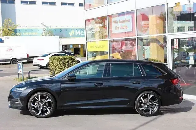 Gebraucht Skoda Octavia SportLine 210 PS (154 kW) 2023 Cerna magic/black magic (metallic) Kombi