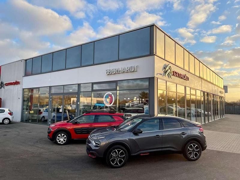 Platiniumgrau Gebraucht 2023 Citroën e-C4 Feel Limousine | 24.879 € (Teuer) - Bild 1/4