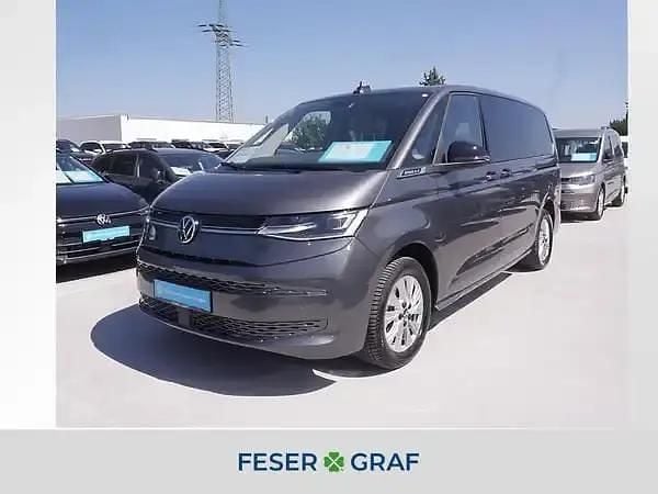 Indiumgrau metallic Gebraucht 2024 VW Multivan Van / Kleinbus | 53.840 € (Guter Preis) - Bild 1/2