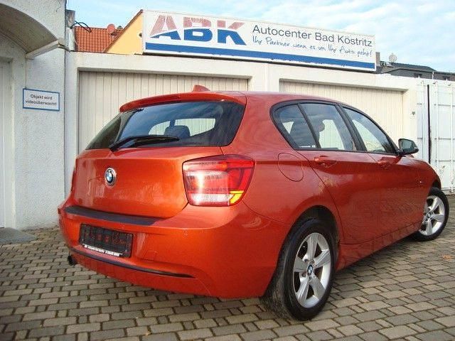 Gebraucht BMW 114 Sport Line 102 PS (75 kW) 2014 Orange Kleinwagen