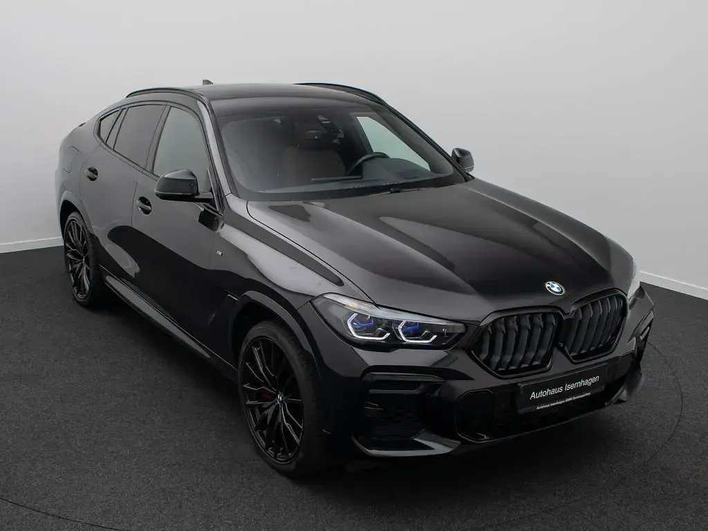 Gebraucht BMW X6 M50 Performance 530 PS (389 kW) 2023 Saphirschwarz  475braun SUV