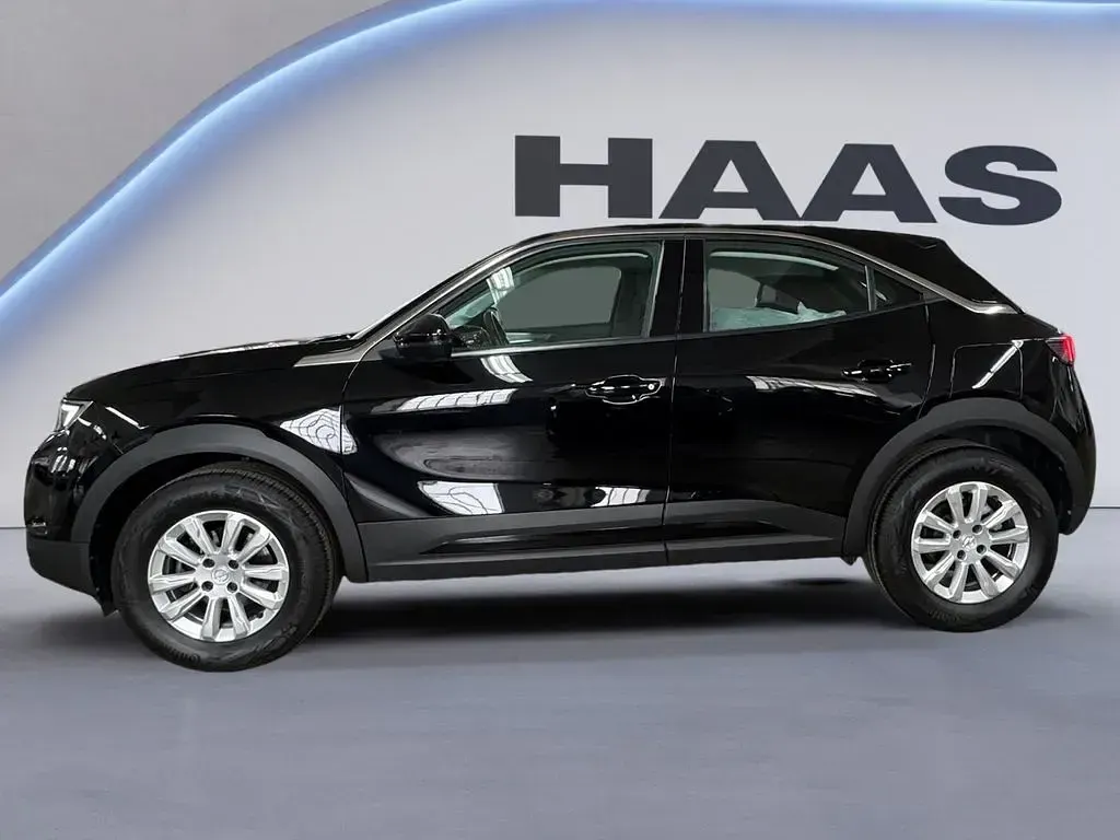 Gebraucht Opel Mokka Enjoy 101 PS (74 kW) 2023 Lackierung schwarz perla nera/ SUV