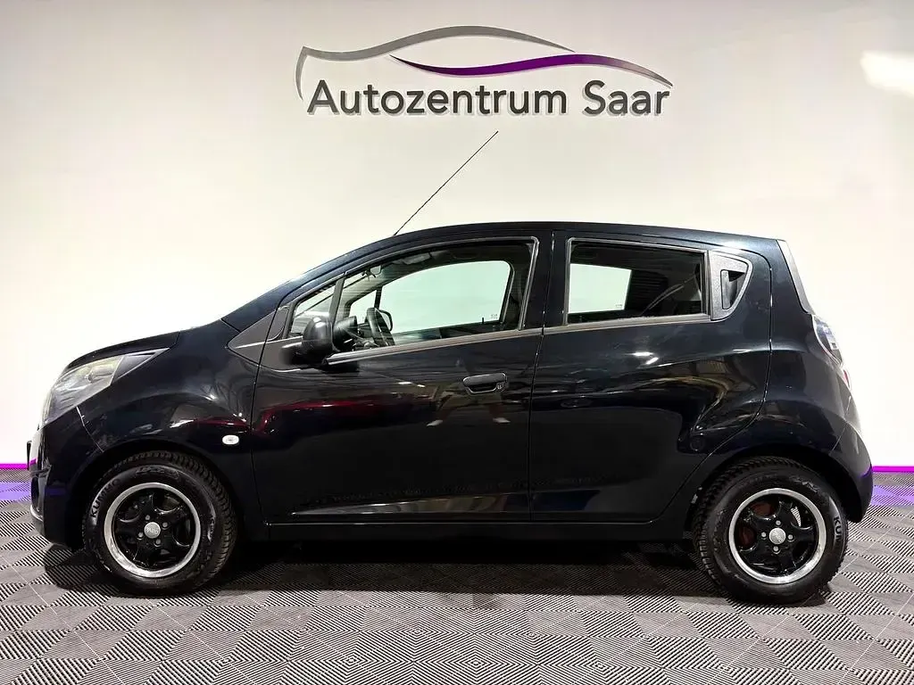 Gebraucht Chevrolet Spark 68 PS (50 kW) 2012 Schwarz Kleinwagen