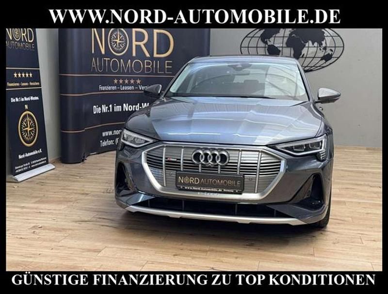 Grau Gebraucht 2021 Audi e-tron S-Line SUV | 33.900 € (Superpreis) - Bild 1/3