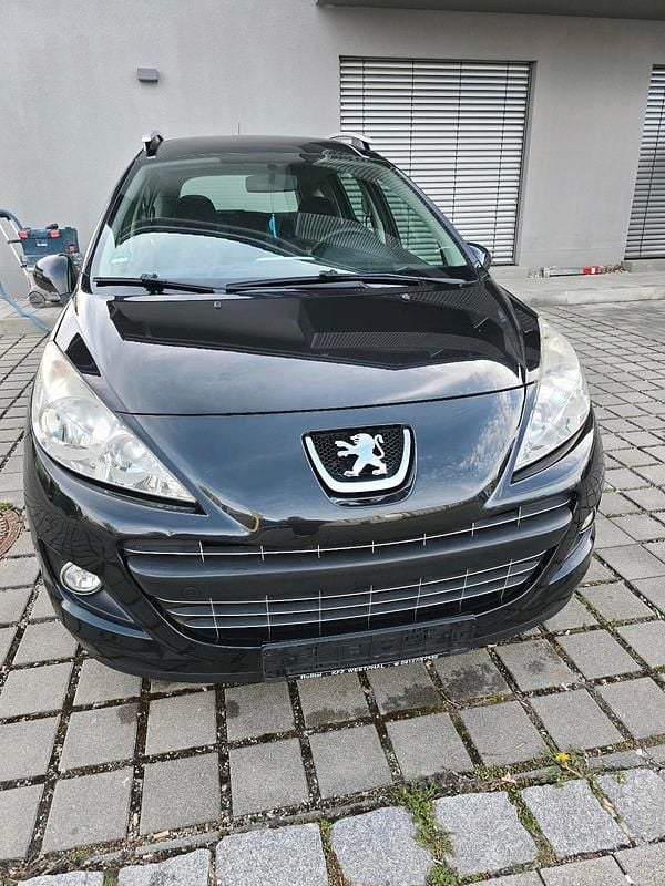 Gebraucht Peugeot 207 95 PS (69 kW) 2011 Schwarz Kombi