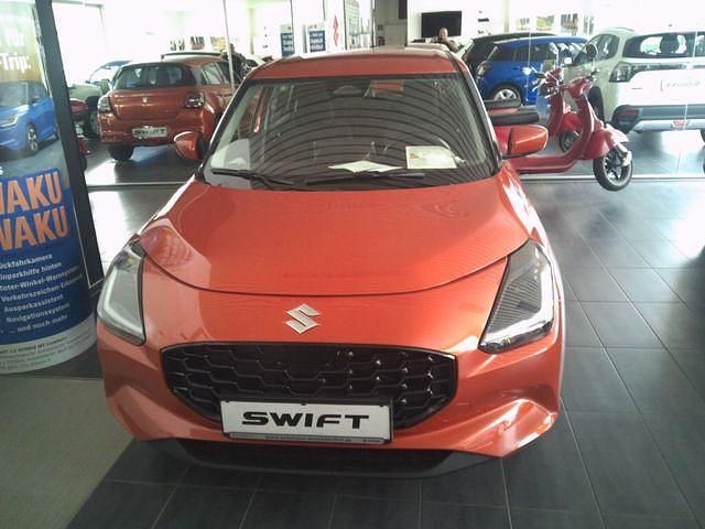 Orange Neu 2025 Suzuki Swift Club Kleinwagen | 18.790 € - Bild 1/4