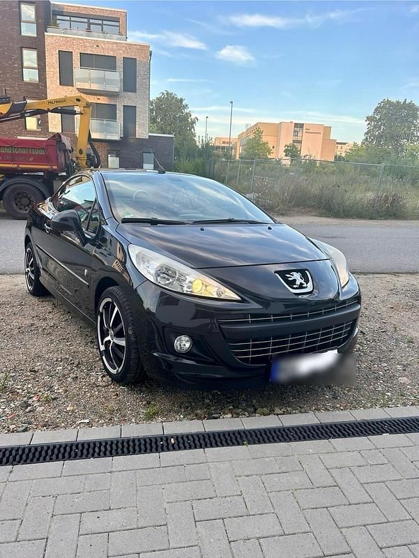 Schwarz Gebraucht 2010 Peugeot 207 CC Roland Garros Cabrio | 4.499 € (Etwas zu teuer) - Bild 1/4