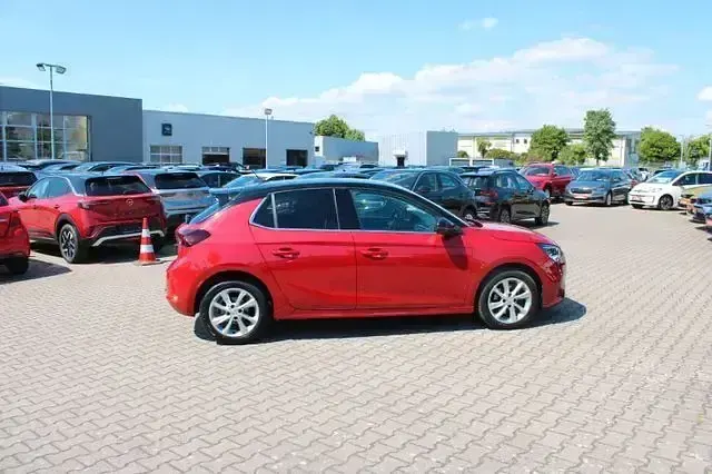 Używany Opel Corsa Elegance 101 KM (74 kW) 2023 Czerwony Hatchback