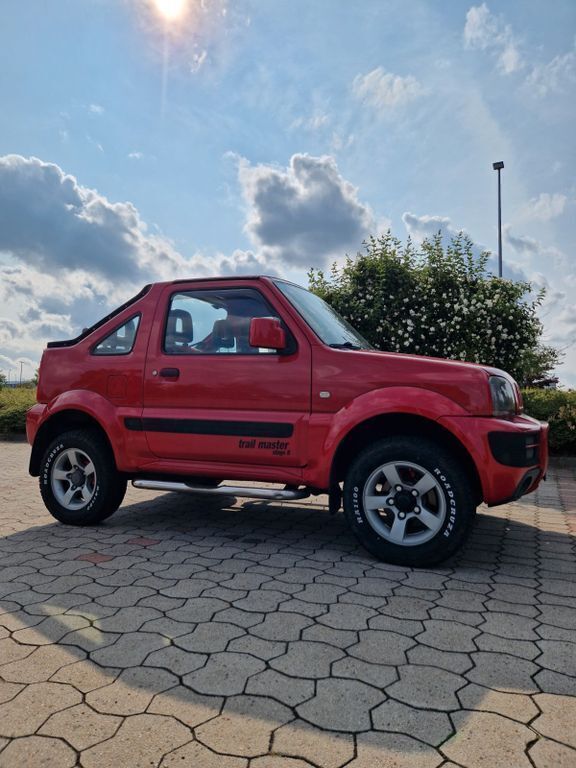 Rot Gebraucht 2006 Suzuki Jimny SUV | 8.300 € (Teuer) - Bild 1/4