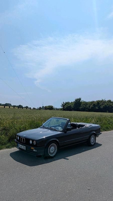 Schwarz Gebraucht 1989 BMW 325 Cabriolet Shadowline Cabrio | 25.399 € - Bild 1/4