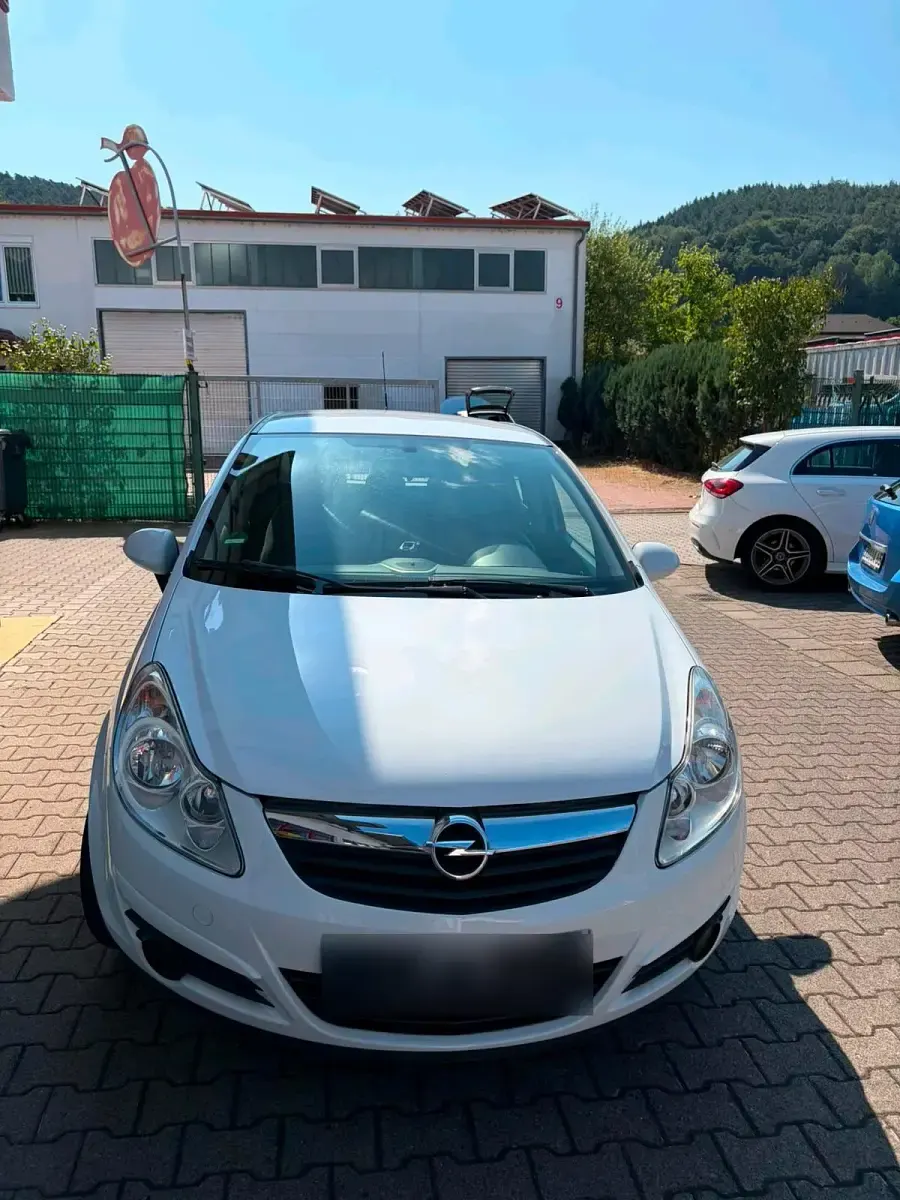 Gebraucht Opel Corsa 60 PS (44 kW) 2009 Weiß Kleinwagen