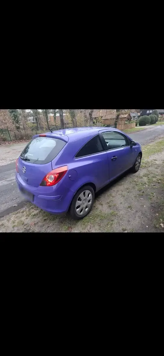 Gebraucht Opel Corsa 69 PS (50 kW) 2014 Violet Kleinwagen