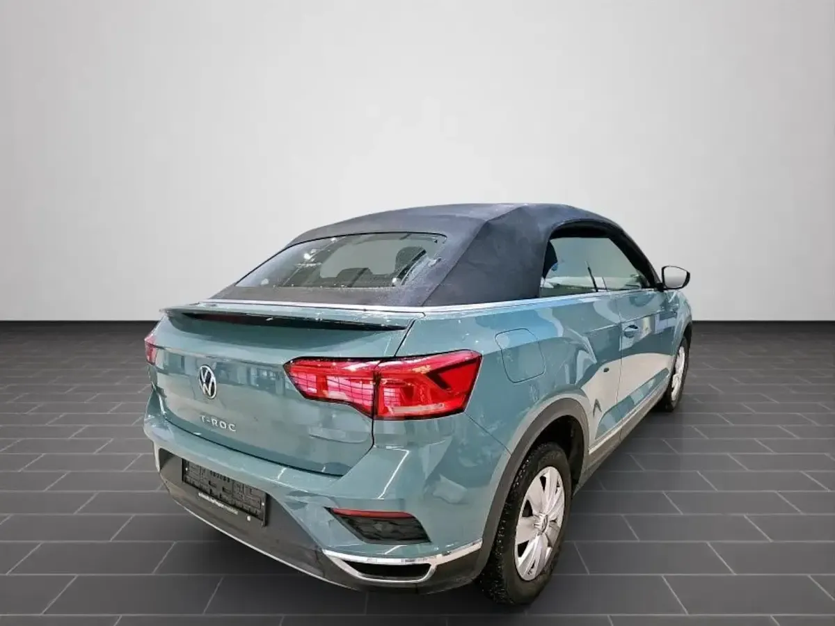 Gebraucht VW T-Roc Active 150 PS (110 kW) 2021 Cactus green schwarz SUV