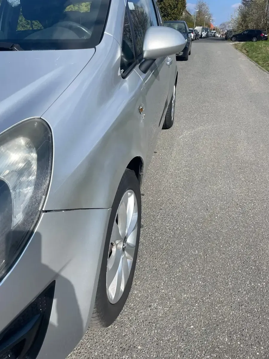 Używany Opel Corsa Active 87 KM (63 kW) 2013 Srebrny Hatchback