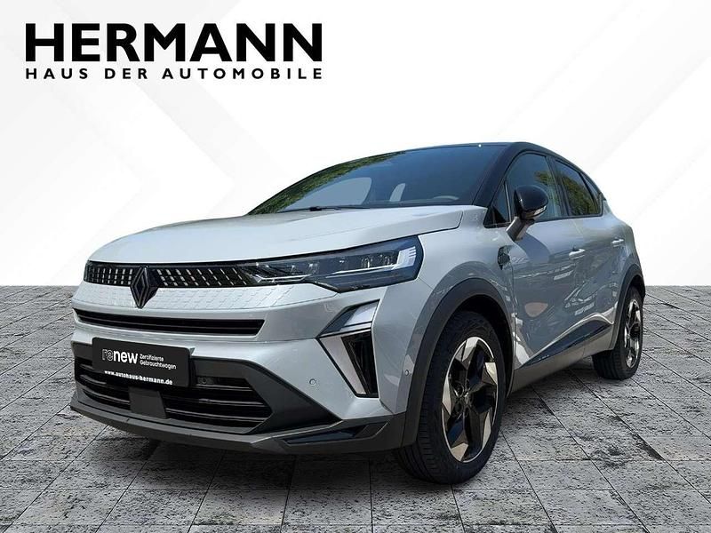 Rafalgrau metallic, black pea Gebraucht 2024 Renault Captur Techno SUV | 26.978 € (Fairer Preis) - Bild 1/4