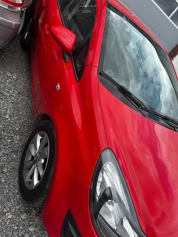 Gebraucht Opel Corsa 95 PS (69 kW) 2015 Rot Kleinwagen