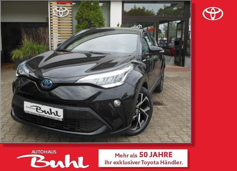 Mysticschwarz mica Gebraucht 2021 Toyota C-HR Team SUV | 22.573 € (Guter Preis) - Bild 1/4