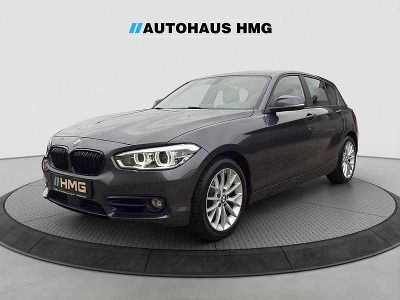 Grau Gebraucht 2015 BMW 118 Sport Line Kleinwagen | 14.900 € (Fairer Preis) - Bild 1/4