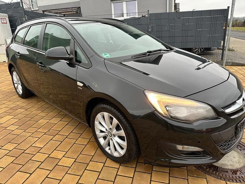 Second-hand Opel Astra 131 CP (96 kW) 2013 Negru Break