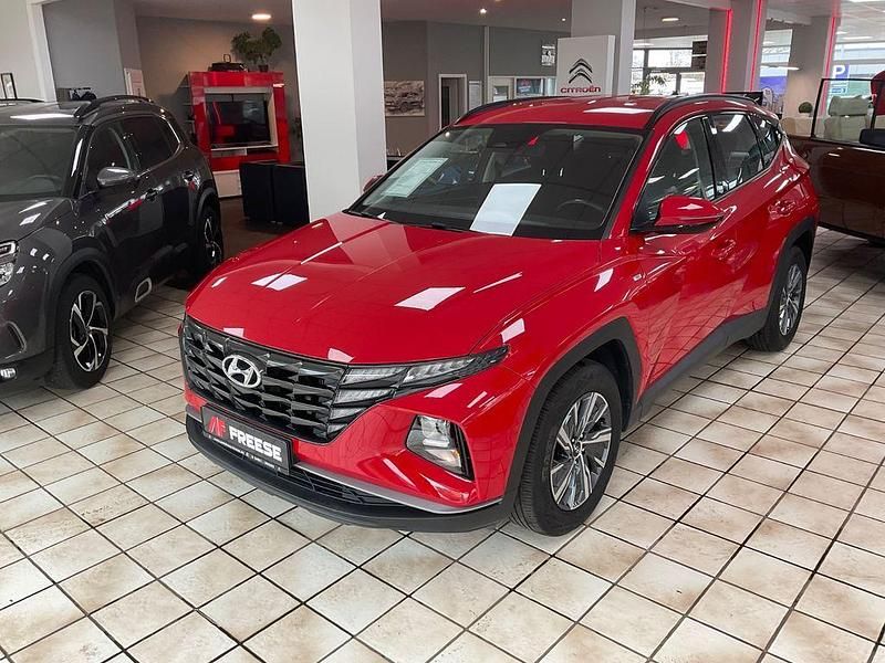 Engine red / sol Gebraucht 2022 Hyundai Tucson Select SUV | 23.990 € (Fairer Preis) - Bild 1/4
