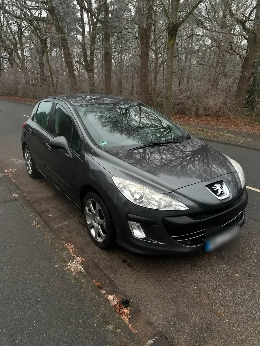 Gebraucht Peugeot 308 98 PS (72 kW) 2011 Grau Kleinwagen
