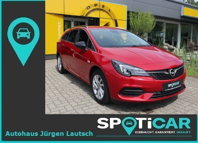 Red metallic Gebraucht 2021 Opel Astra Kombi | 14.750 € (Fairer Preis) - Bild 1/4