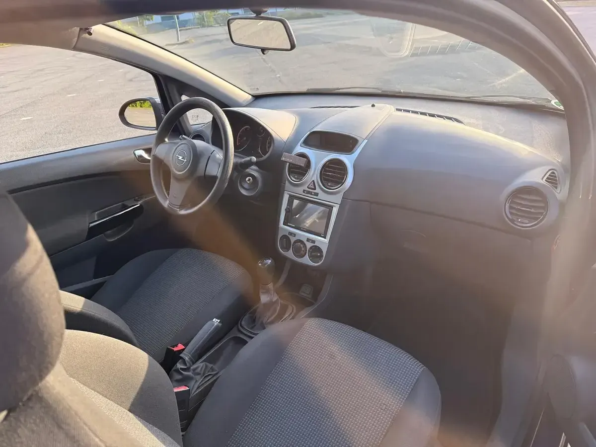Używany Opel Corsa 68 KM (50 kW) 2013 Niebieski Hatchback