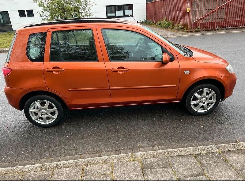 Second-hand Mazda 2 80 CP (58 kW) 2003 Portocaliu Hatchback