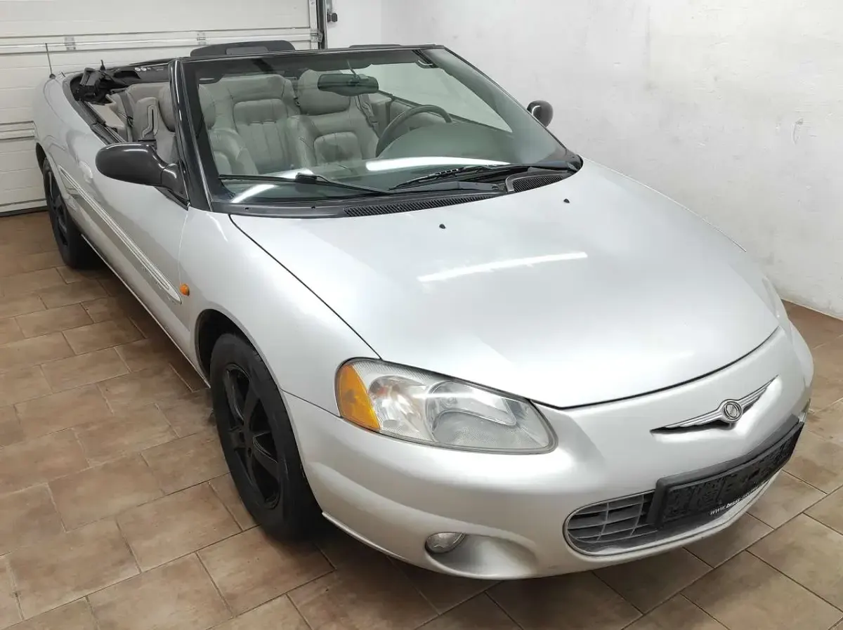 Second-hand Chrysler Sebring Cabriolet 203 CP (149 kW) 2001 Argintiu Cabrio